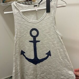 Poofw cotton and rayon tank shirt with blue anchor on front.